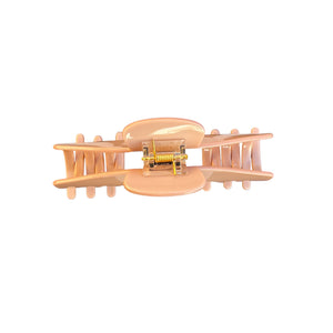 Back view of the Cashmere blush nude hat claw clip showing the spring hinge and wide opening designed to secure thick hair.