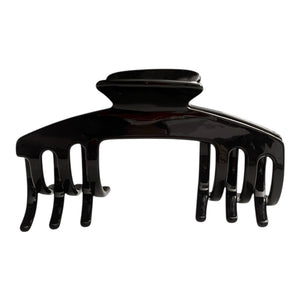 Front view of the Eclipse glossy black hat claw clip designed for secure, comfortable hairstyles while wearing hats.