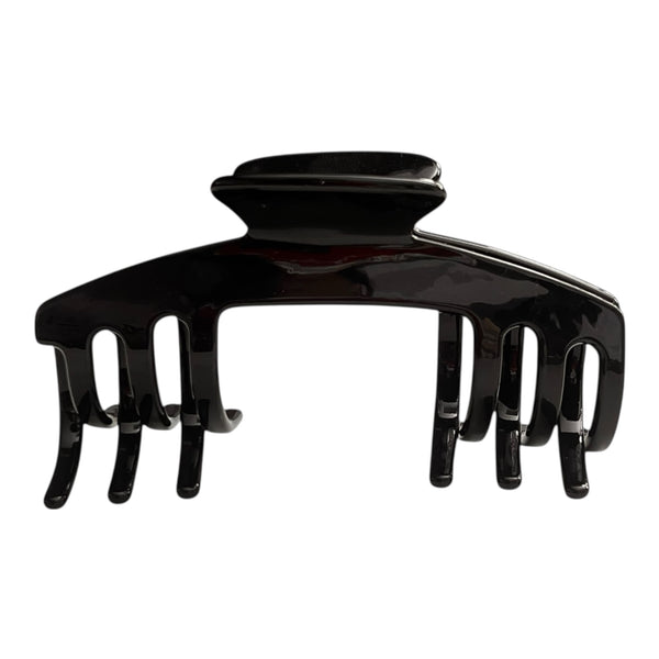 Front view of the Eclipse glossy black hat claw clip designed for secure, comfortable hairstyles while wearing hats.