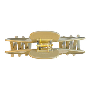 Back view of the Haven taupe hat claw clip showing the spring hinge and wide opening designed to secure thick hair.