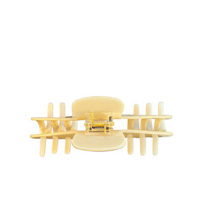 Back view of the Ivory cream hat claw clip showing the spring hinge and wide opening designed to secure long, thick hair.