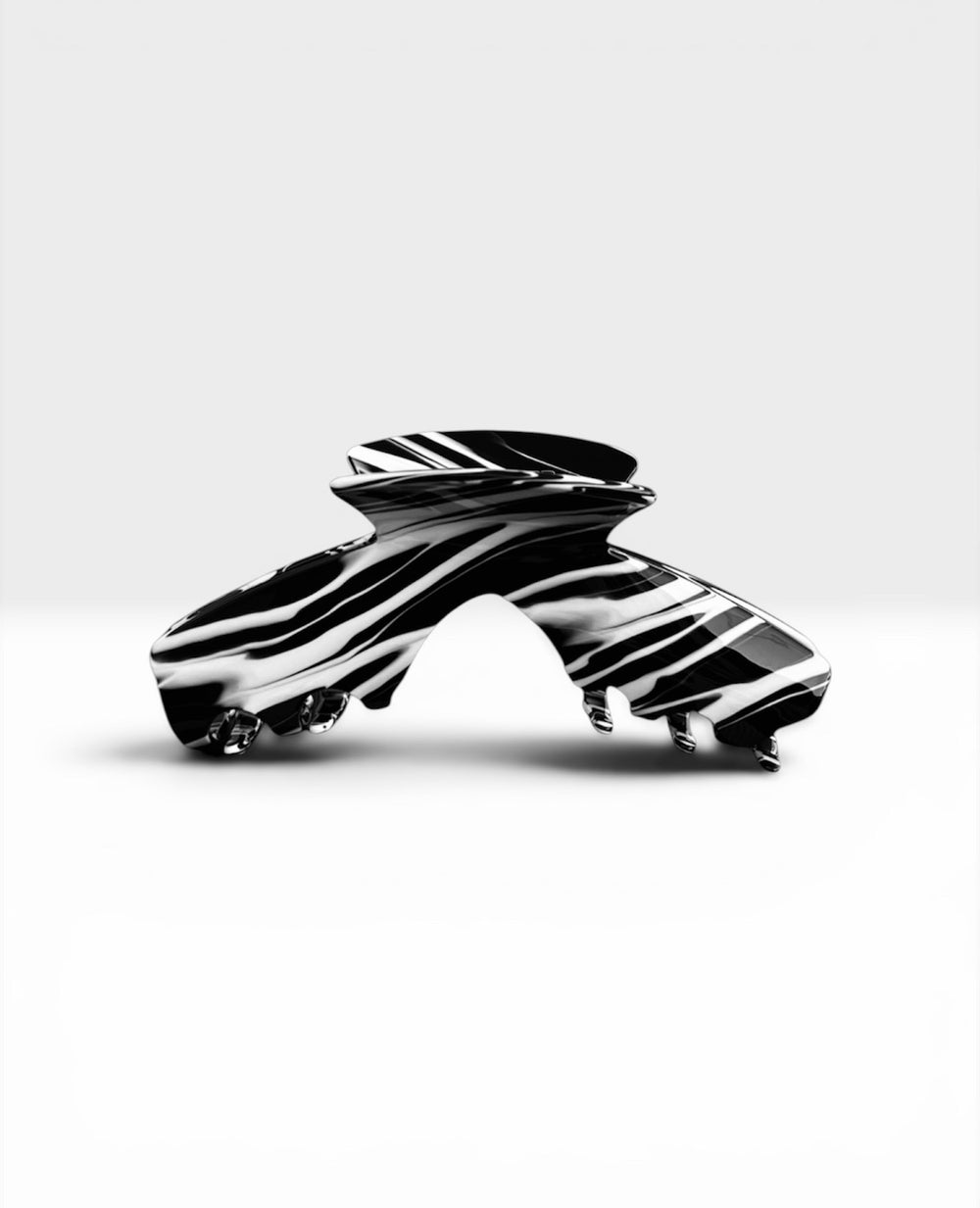 Front view of the Noir black and white swirl hat claw clip designed for secure, comfortable hairstyles with baseball caps, trucker hats, and golf hats.