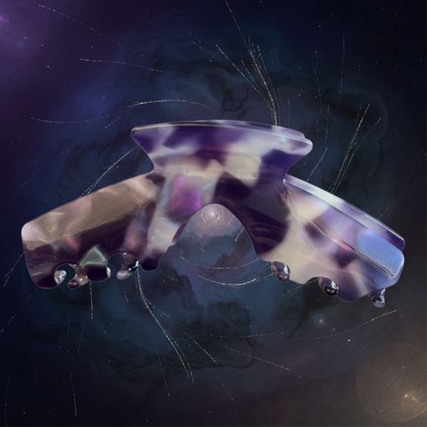 Nova purple marble hat claw clip displayed against a dark artistic background, highlighting its rich multicolor finish.