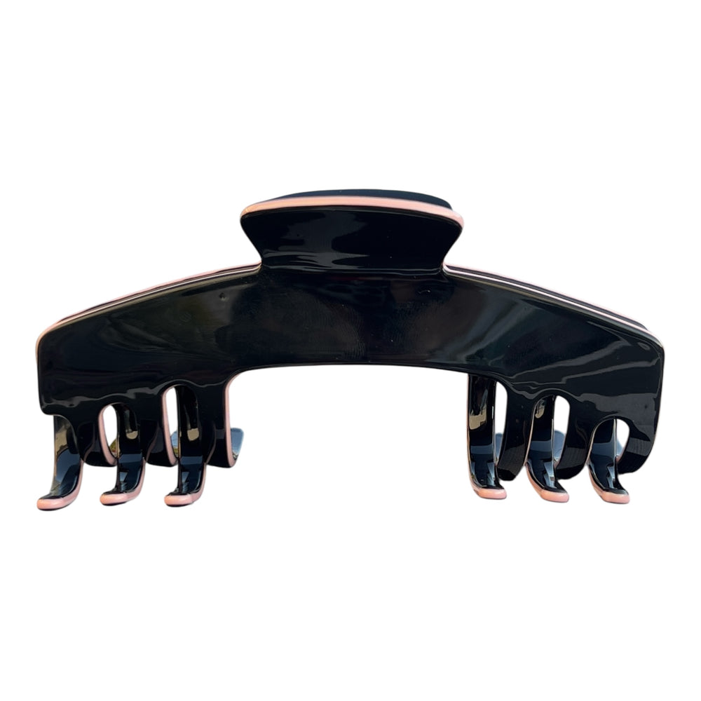 Angled view of the Onyx black hat claw clip showing its curved shape and strong Power Hold grip for long, thick hair.