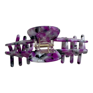 Back view of the Orchid purple marble hat claw clip showing the spring hinge and wide opening for a secure hold.