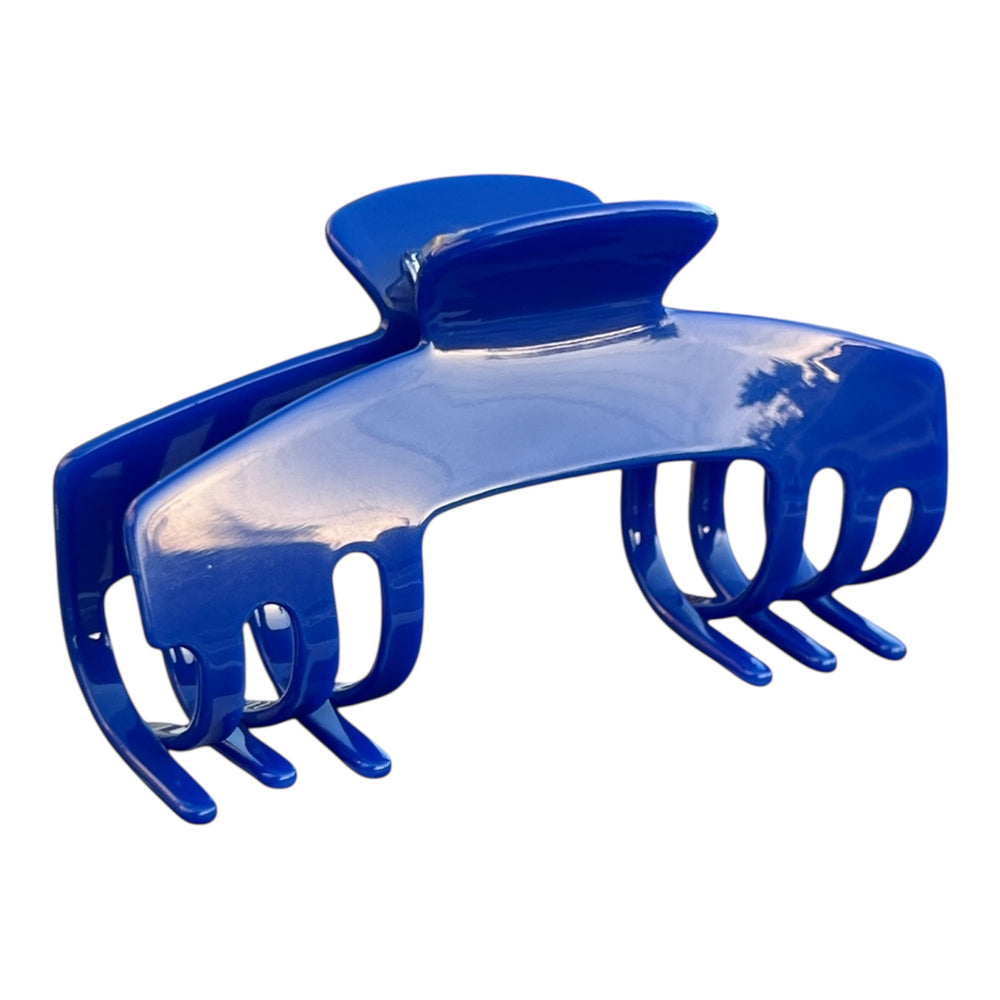Relentless cobalt blue hair claw clip for hats by Baddie Clip on a white background, designed to securely hold thick hair.