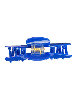 Rear view of the Relentless cobalt blue hair claw clip showing the spring hinge and wide opening designed to securely hold thick, long, and textured hair.