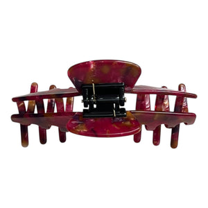 Back view of the Ruby red mosaic hat claw clip showing the spring hinge and wide opening for a secure hold.