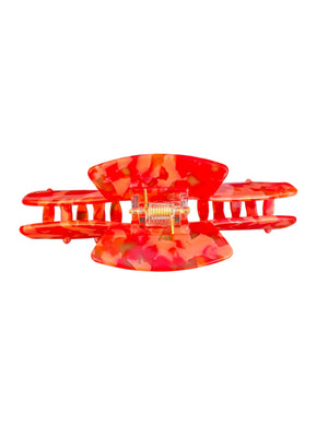 Back view of the Scarlet red mosaic hat claw clip showing the hinge and wide opening for a secure hold.