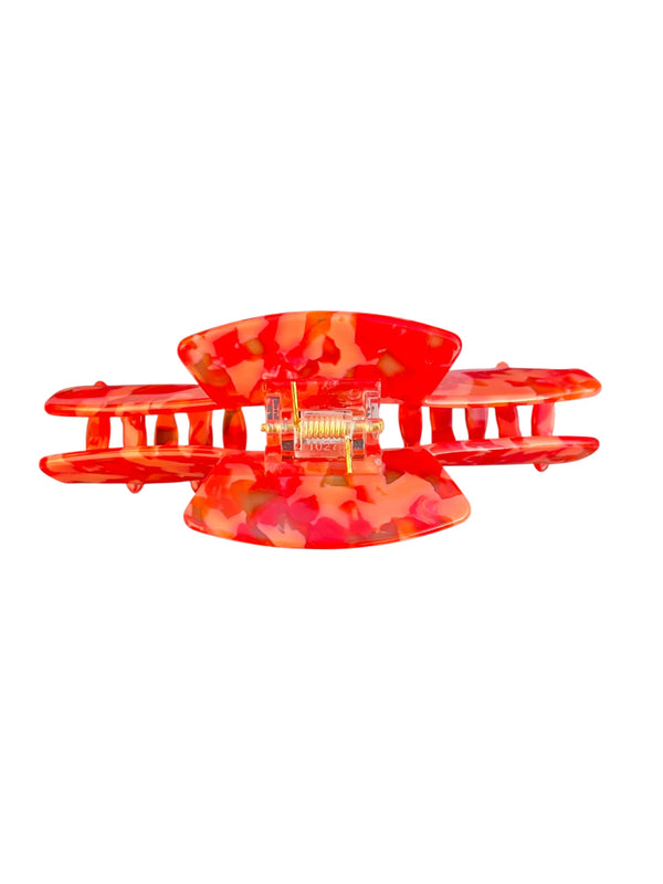 Back view of the Scarlet red mosaic hat claw clip showing the hinge and wide opening for a secure hold.