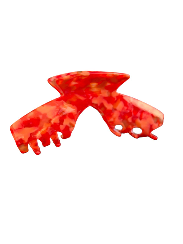 Side view of the Scarlet red mosaic hat claw clip highlighting the low-profile design and smooth teeth.