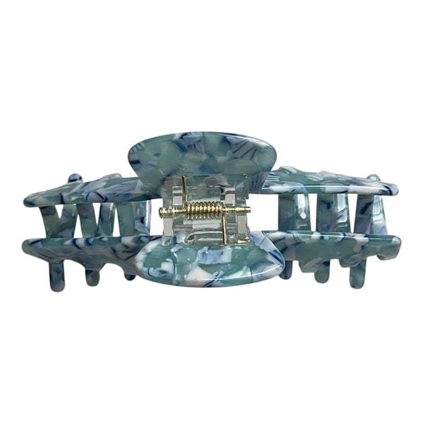 Back view of the Sea Glass blue marble claw clip showing the hinge, spring, and claw opening.