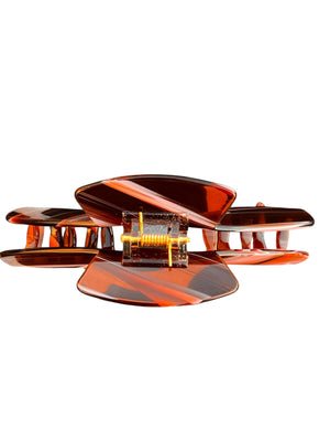 Back view of the Siren amber tortoise hat claw clip displaying the durable spring hinge and low-profile design for hats.