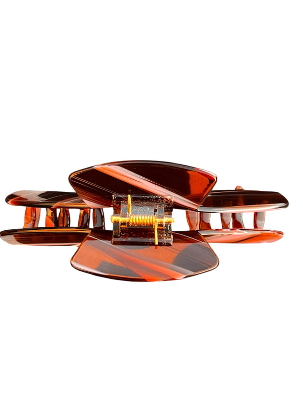 Back view of the Siren amber tortoise hat claw clip displaying the durable spring hinge and low-profile design for hats.