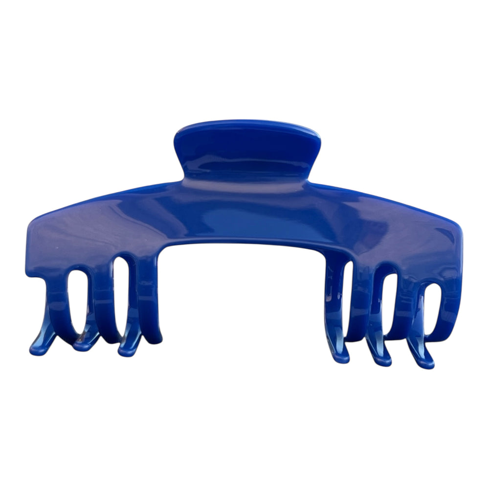 Relentless cobalt blue hair claw clip for hats by Baddie Clip on a white background, designed to securely hold thick hair.
